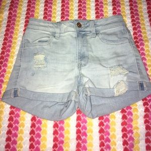 High waisted shorts with rips