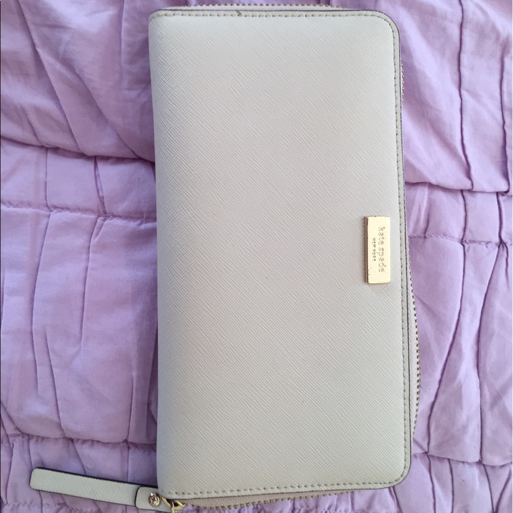Cream Kate Spade wallet.