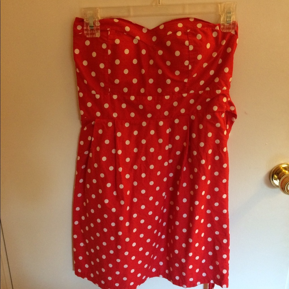 Red dress with white polka dots.