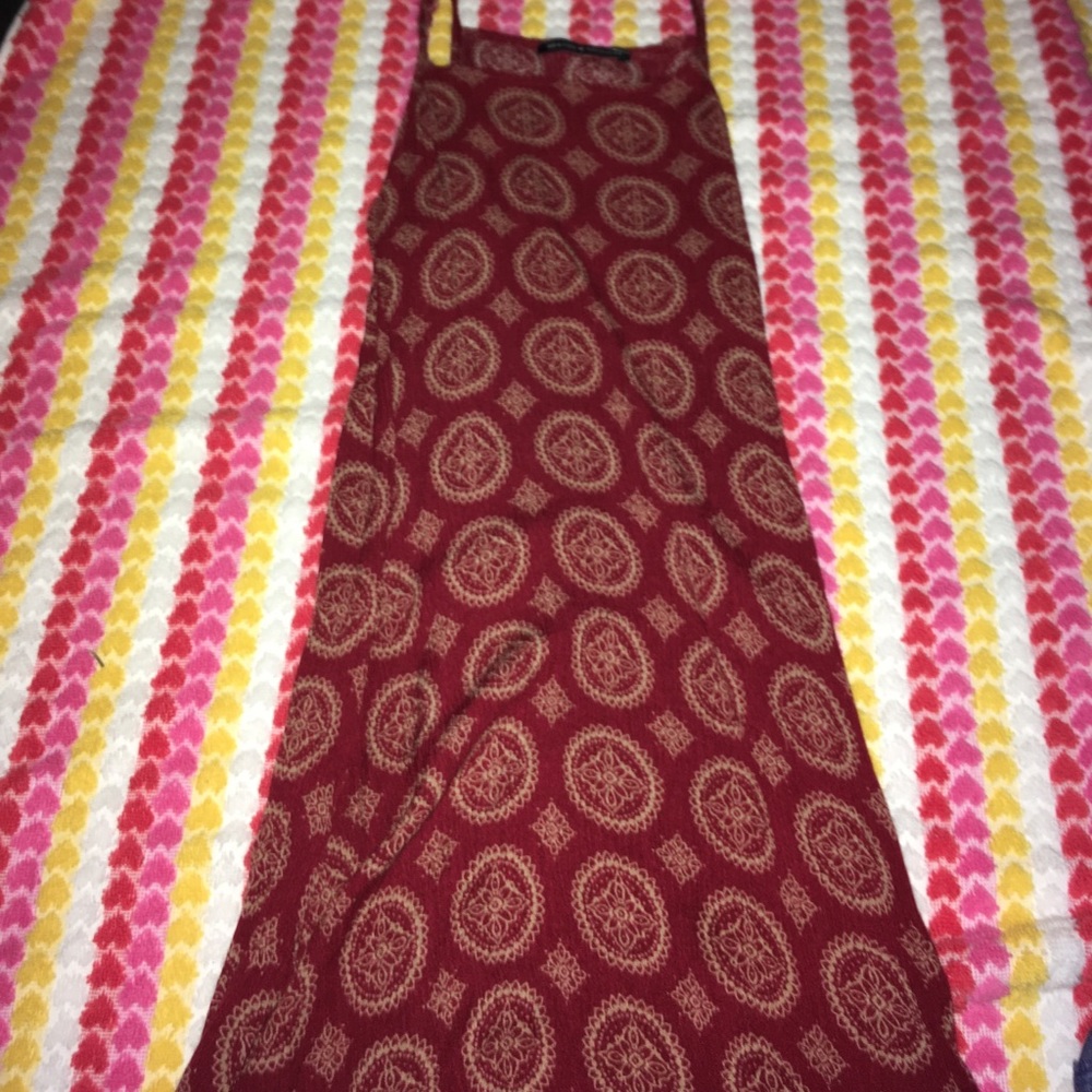 Flowy red dress with some designs