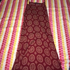 Flowy red dress with some designs