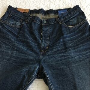 Men's GAP loose fit dark wash button fly jeans.