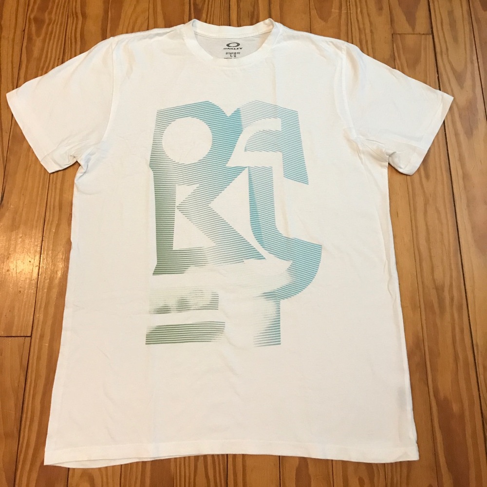 White Oakley shirt.  Size Lg. Regular fit