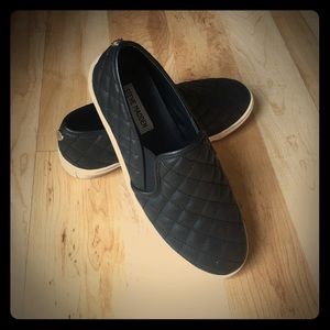 Black Steve Madden slip ons