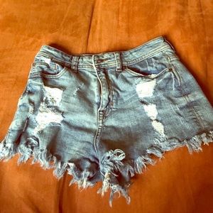 High rise distressed cheeky shorts