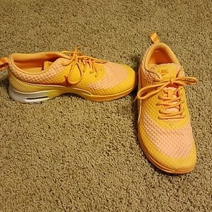 Orange and yellow nike air max