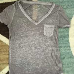 Sheer gray shirtsleeve top with pocket