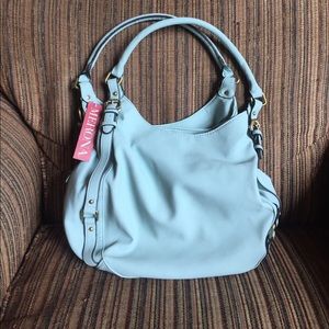 Aqua colored purse *new* never used