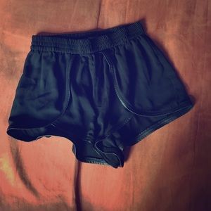 Black high waisted shorts with leather trim