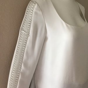 Cartise Tops - Long sleeve white blouse with embellishments arms Cartise Tops - Long sleeve white blouse with embellishments arms