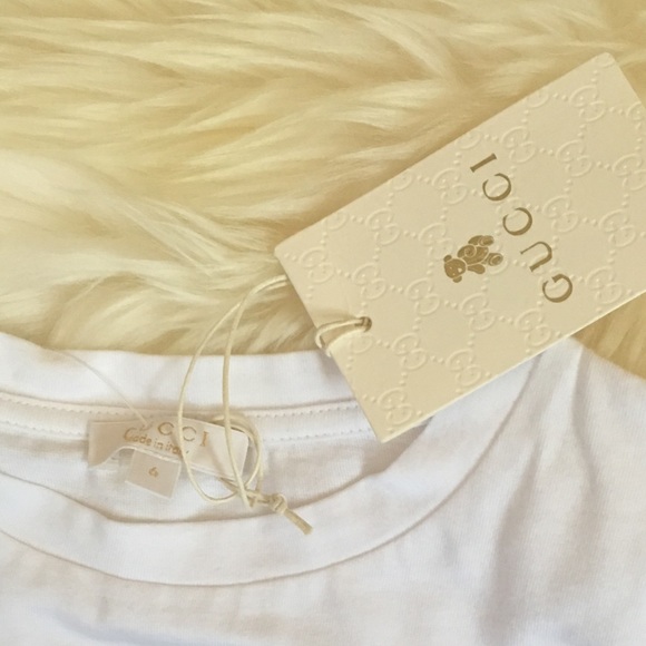 Gucci top and Burberry shorts kids outfit