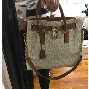 Michael Kors monogram tore