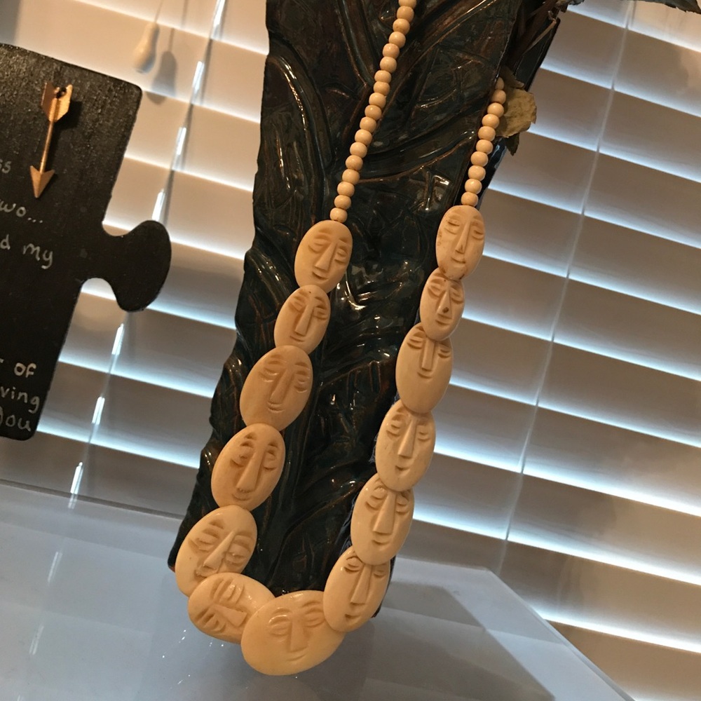 Ivory color Necklace of faces