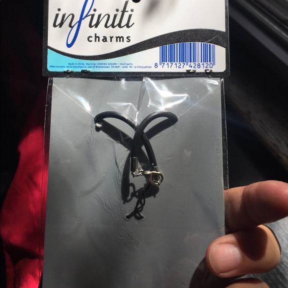 Cute blk charm bracelet w a silver dolphin charm - Picture 3 of 4