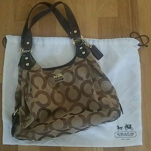 Brown signature Coach bag.