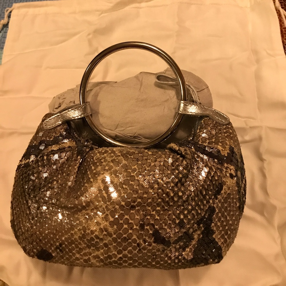 Kate spade wristlet, silver python, made in Italy