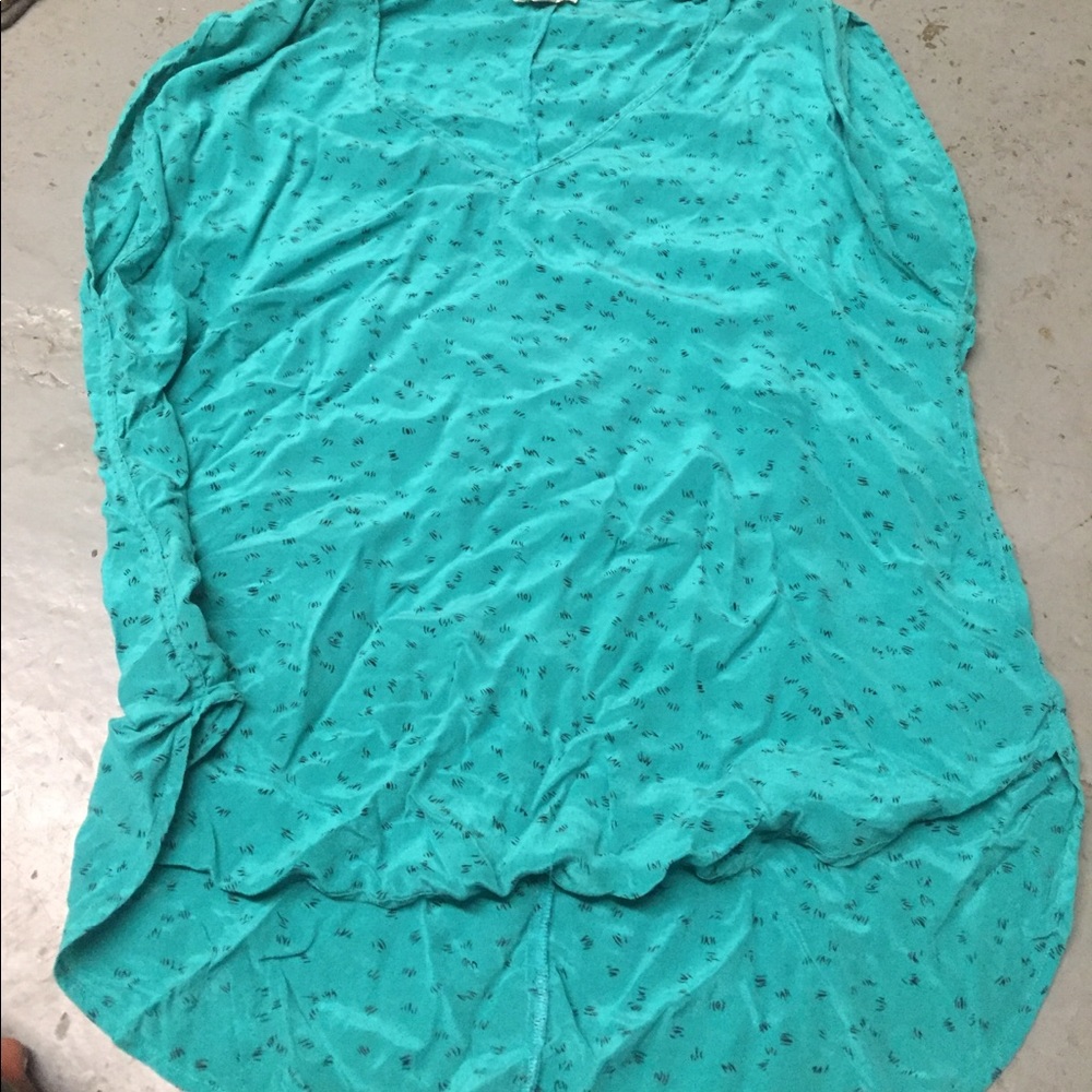turquoise and black print top