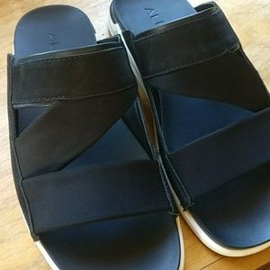 1 month old 'Black Sandals' that are barely worn.