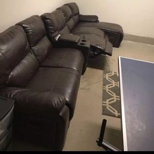 Brown leather home movie theatre couch