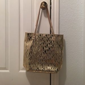 Michael Kors gold tote Authentic.