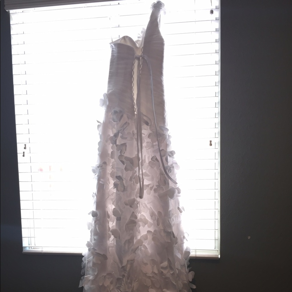 Beautiful, white wedding dress with flowers