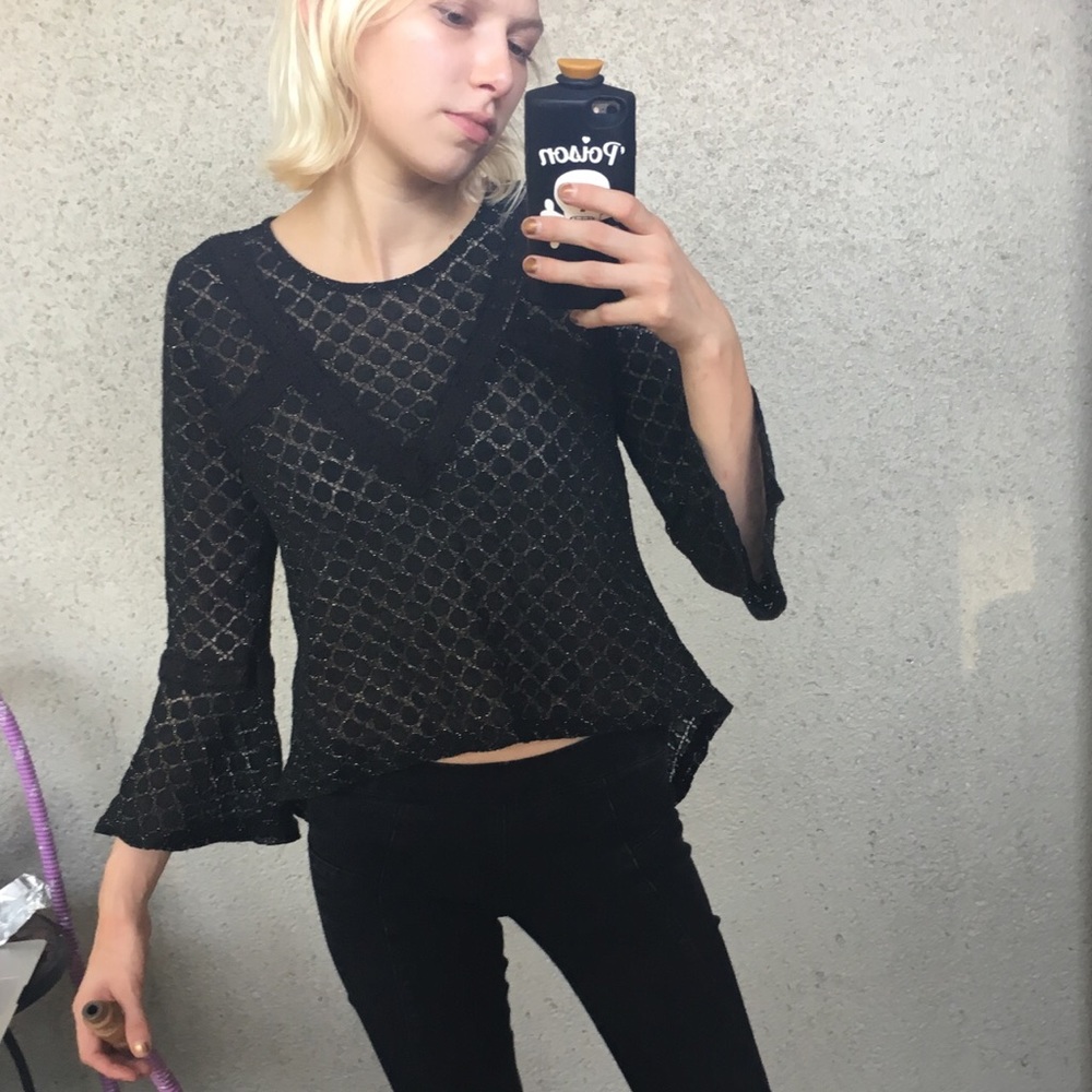 Black and gold lace blouse