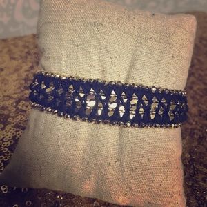 S&D black thread and gold bracelet
