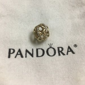 14 karat gold Pandora charm. ( Galaxy)