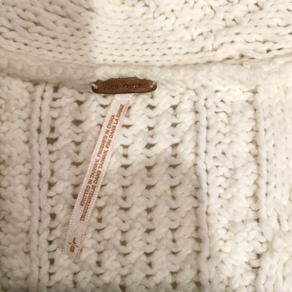 FREE PEOPLE CROP LENGTH, WRAP FRONT, KNIT SWEATER.