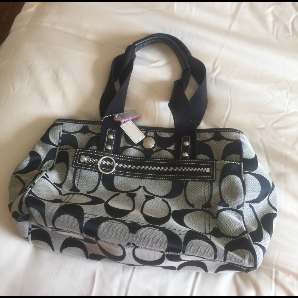Black and grey Coach purse