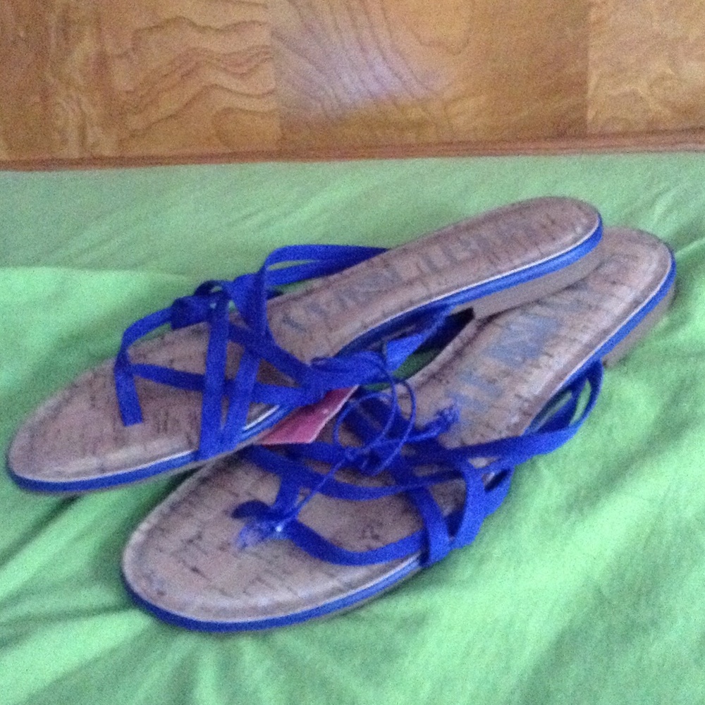 Blue suede slip ons.