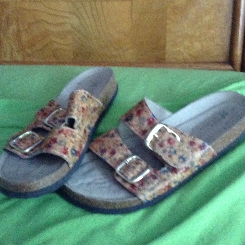 Floral shoes like Birkenstocks.