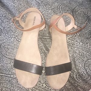 Brown and black sandals with small wedge