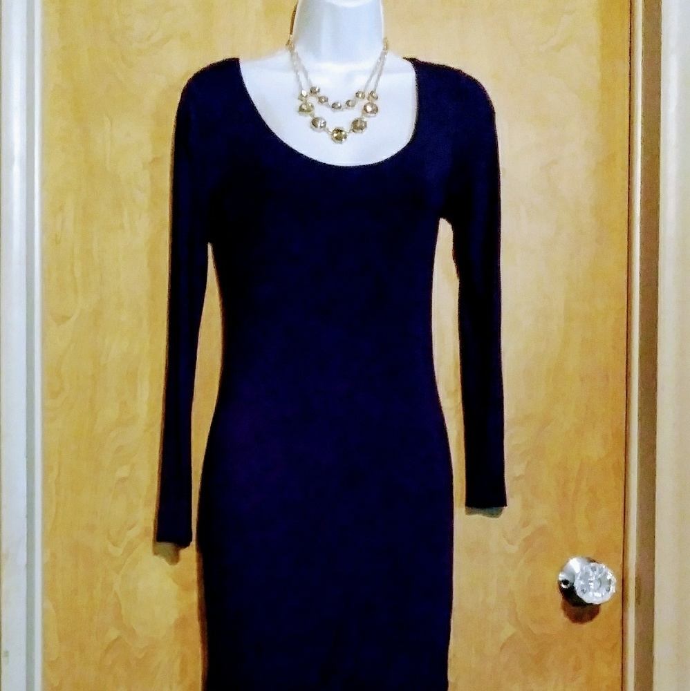 Classic long sleeved, sleek navy above knee dress