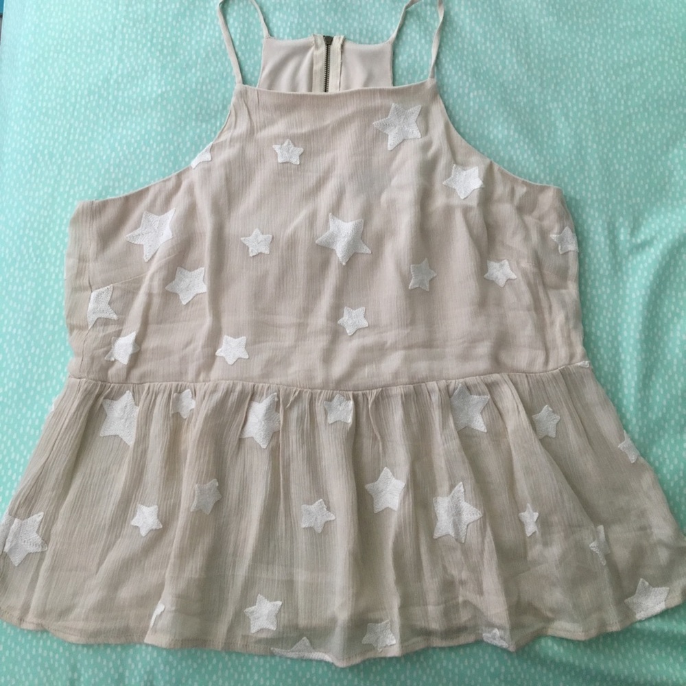 Nora high neck star embroidered peplum tank