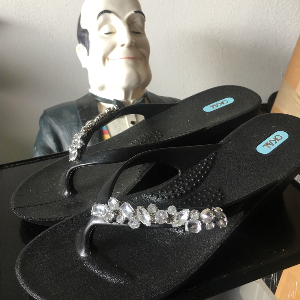 Okal size LG black flip flops