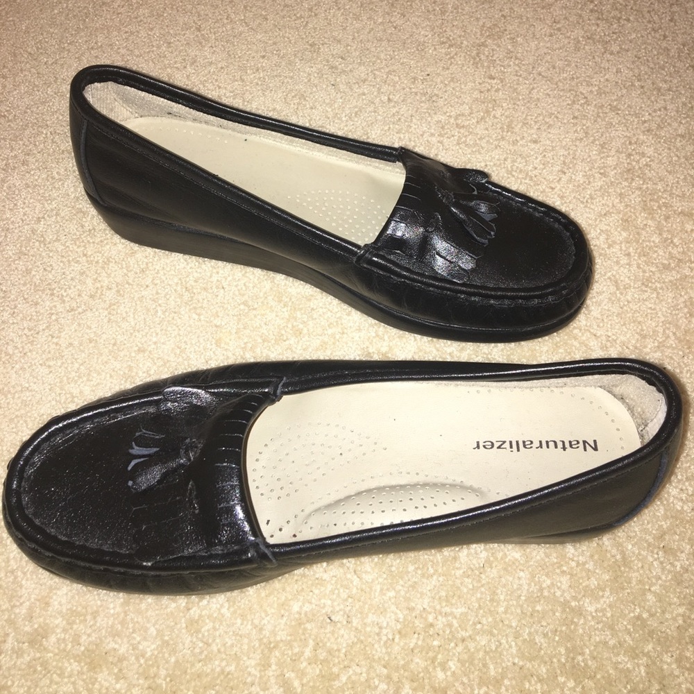 Black flats with a little wedge, size 7.5