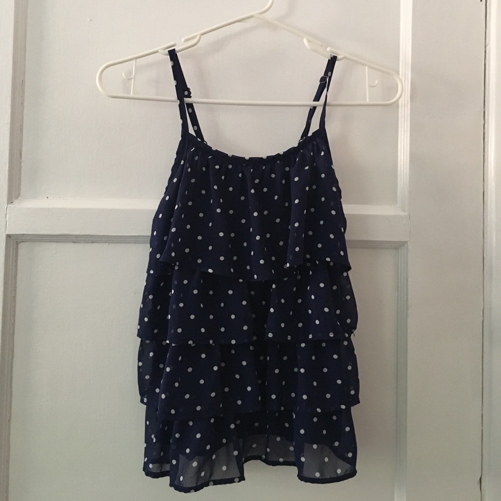 Ruffled poke a dot tank top.