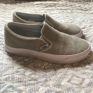 Vans pebble snake slip ons.