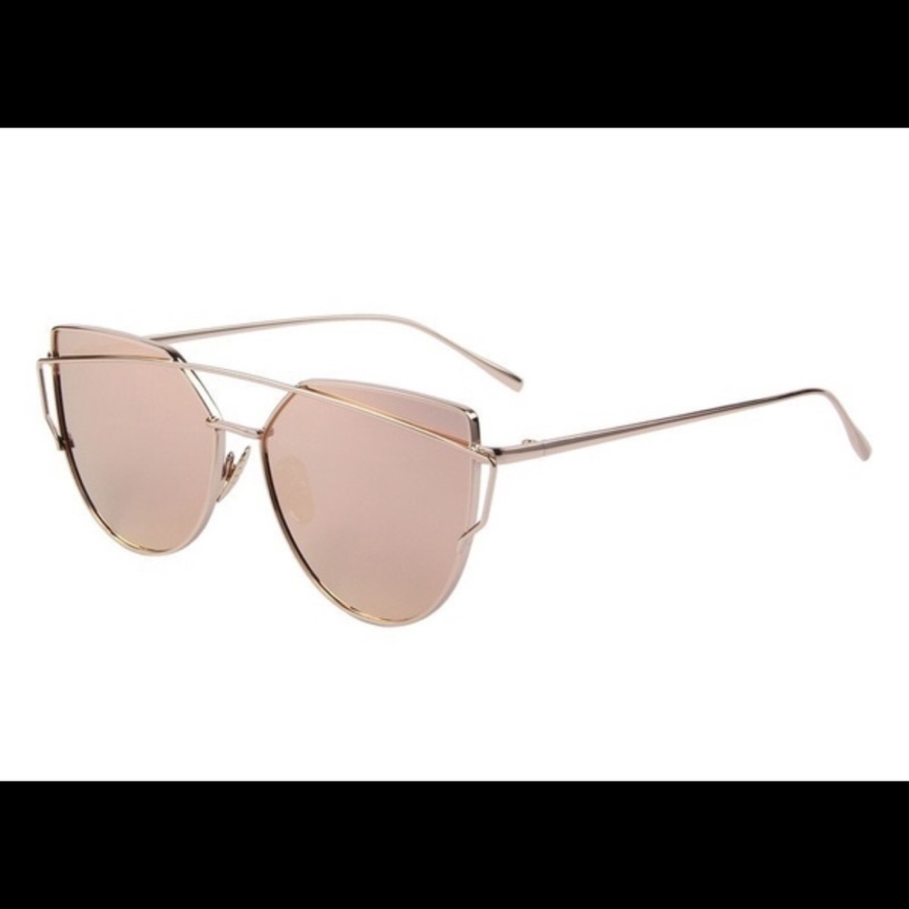 Rose gold lens and gold frame sunglasses