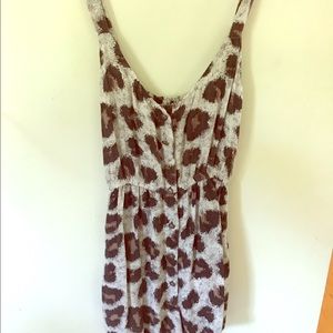 animal print romper with pockets.