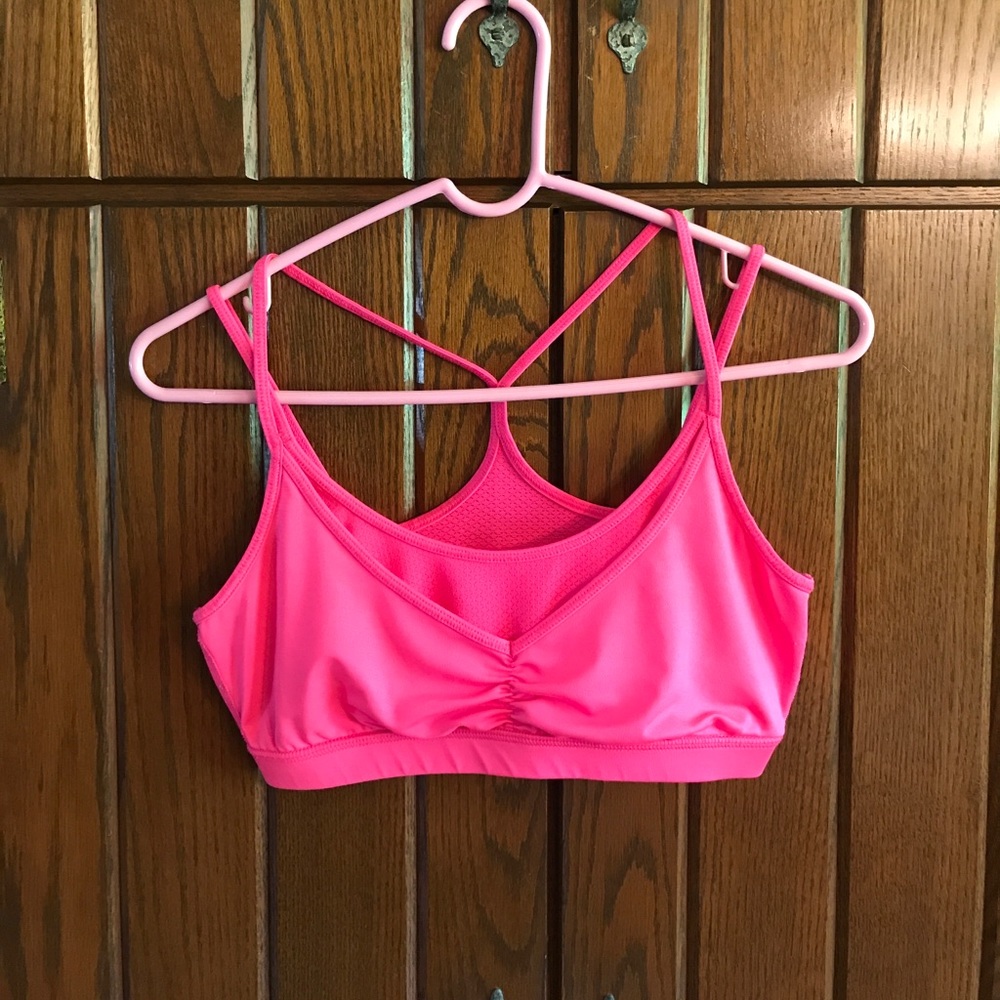 Bright pink bralette.