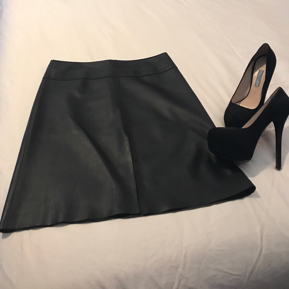 Size 6 leather Bebe mid length skirt