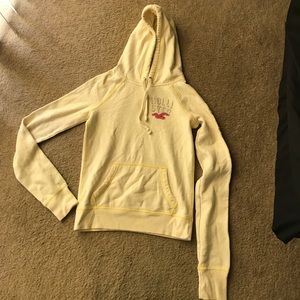 Soft yellow hoodie by Hollister