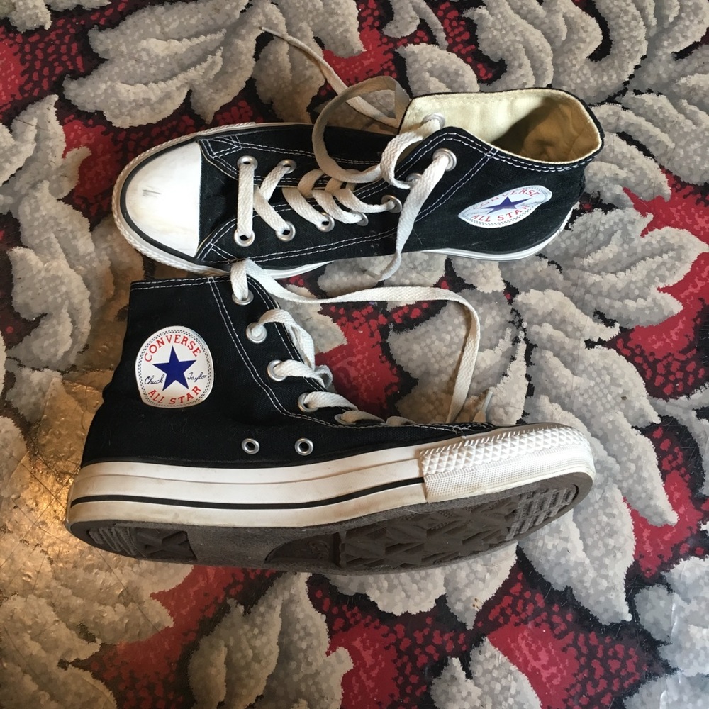 Women's black converse high top shoe