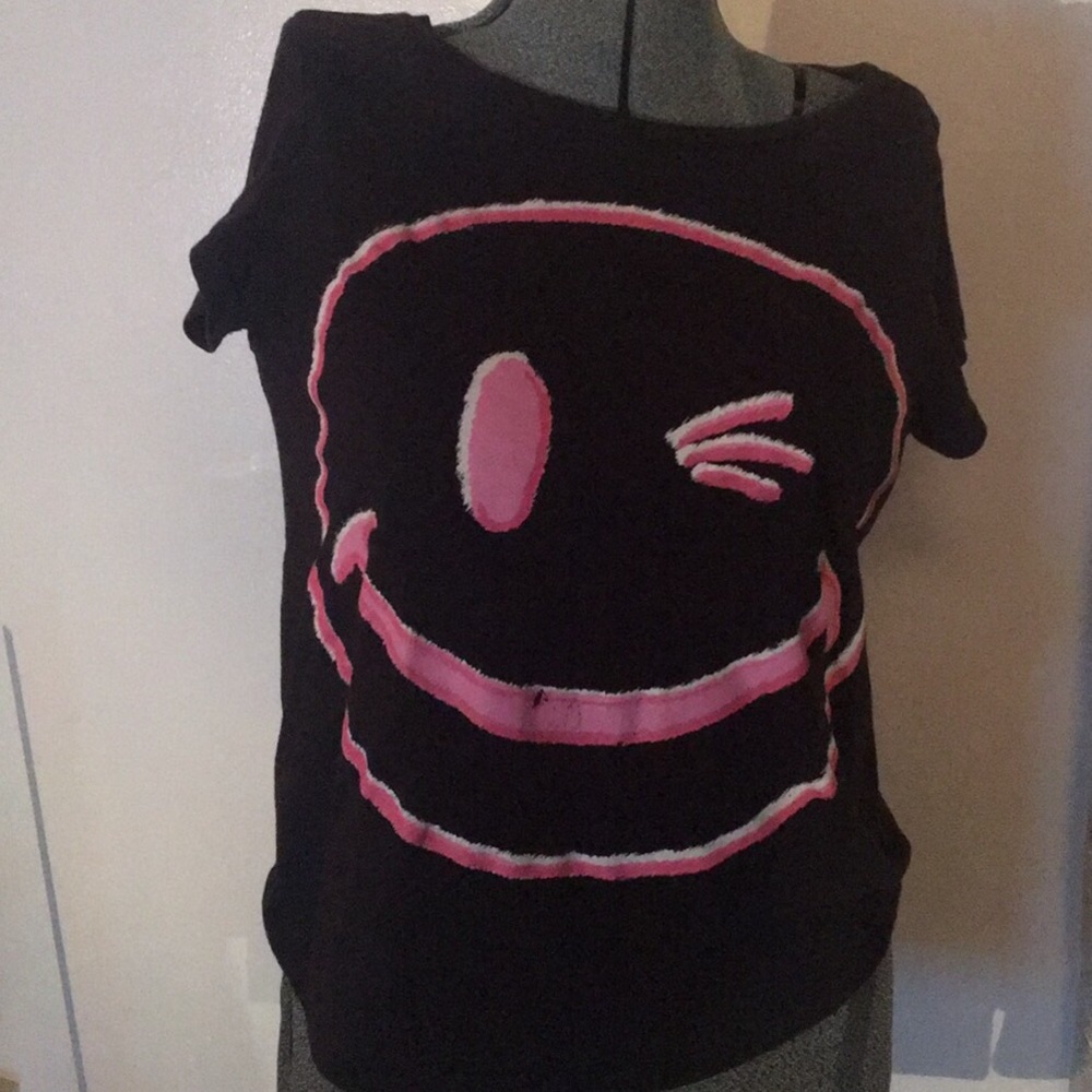 Soft black t-shirt with pink and white winky face