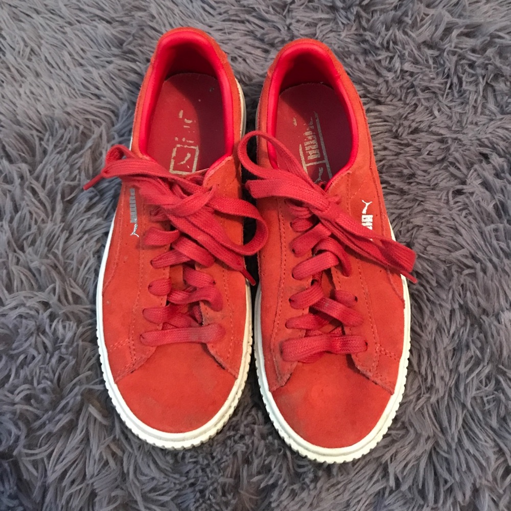 Orange suede puma sneakers