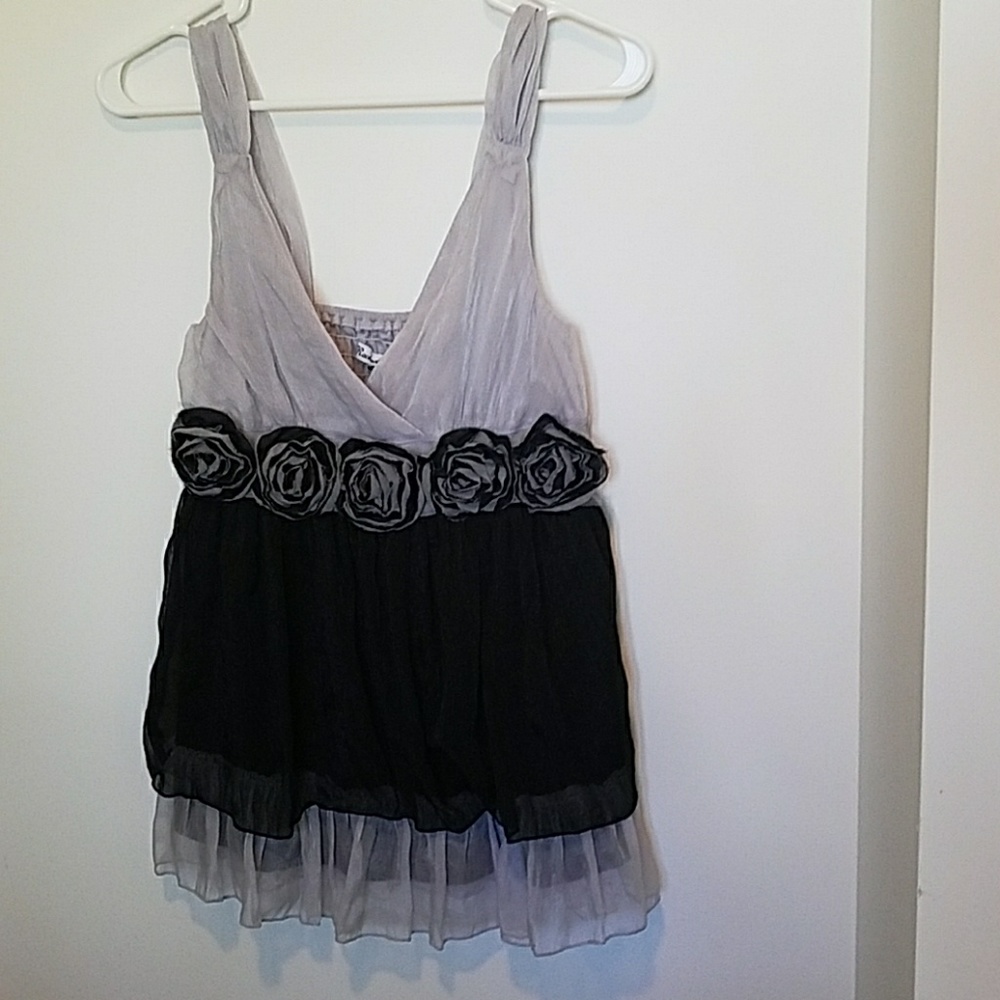 Shimmering sliver and black rose tank top.