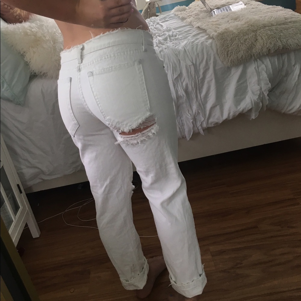 White shredded Carmar jeans