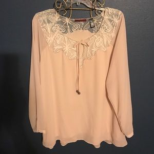 Top lace is cream, long sleeves are sheer.